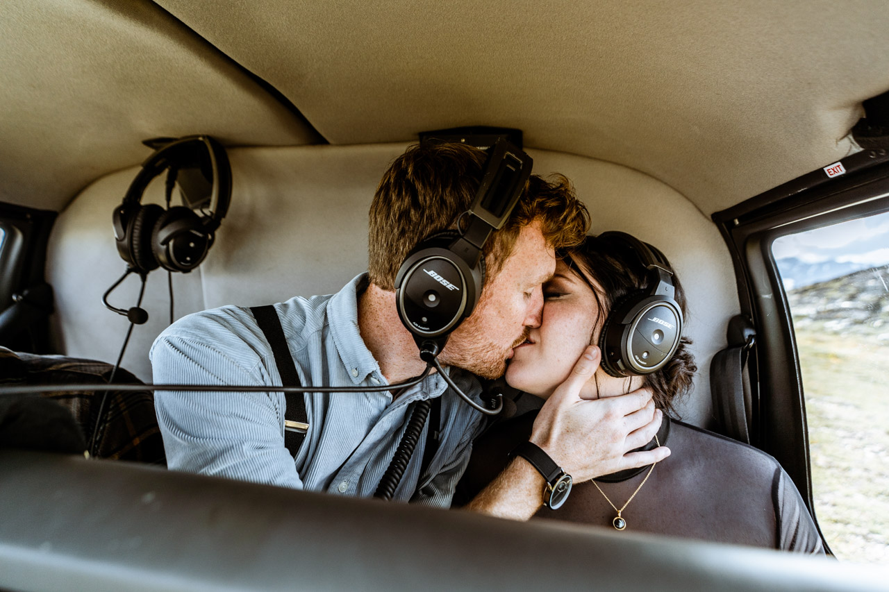 adventure elopement helicopter kiss