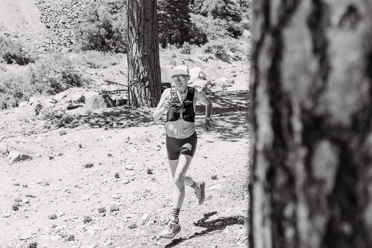 female runner with hoka trailrunning shoes angeles national forest in San Gabriel Mountains mt baldy